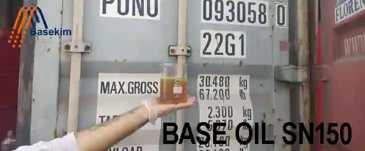 Base Oil SN150 sample held in front of export container by Basekim
