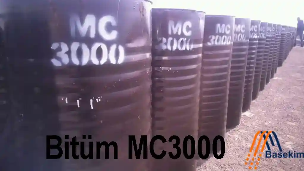 Black steel drums labeled MC3000 bitumen stacked outdoors for export