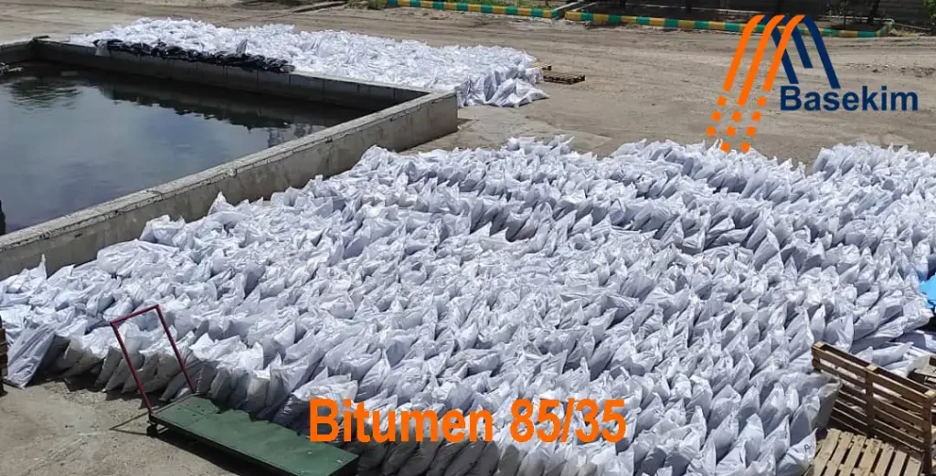 Bitumen 85/35 in sealed steel drums, manufactured by Basekim for use in construction, waterproofing, and industrial insulation.