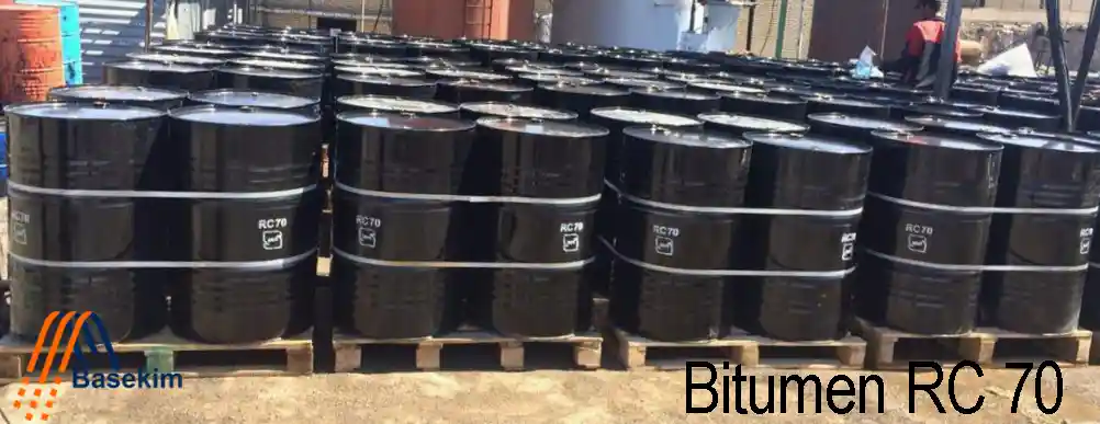 Bitumen RC 70 in sealed steel drums, ready for road construction use, supplied by Basekim for rapid-curing applications.