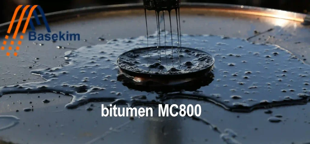 Bitumen MC800 in sealed steel drums, manufactured by Basekim for use in road construction and medium-curing surface treatments.