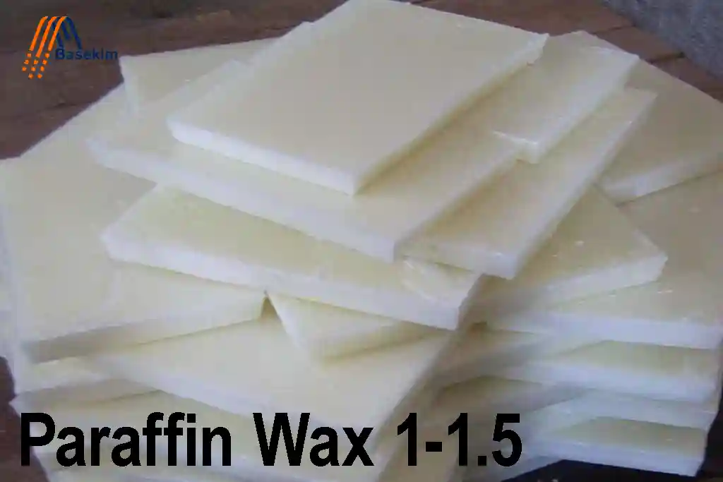 Stacked white slabs of paraffin wax 1-1.5 from Basekim, ready for industrial use.