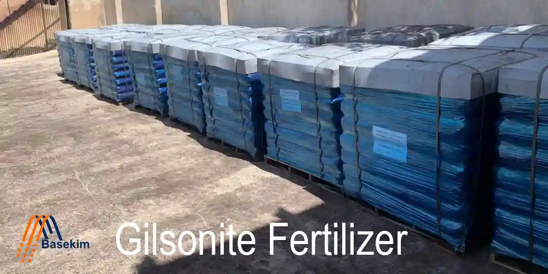 Stacks of packaged Gilsonite fertilizer bags ready for shipment at Basekim facility.